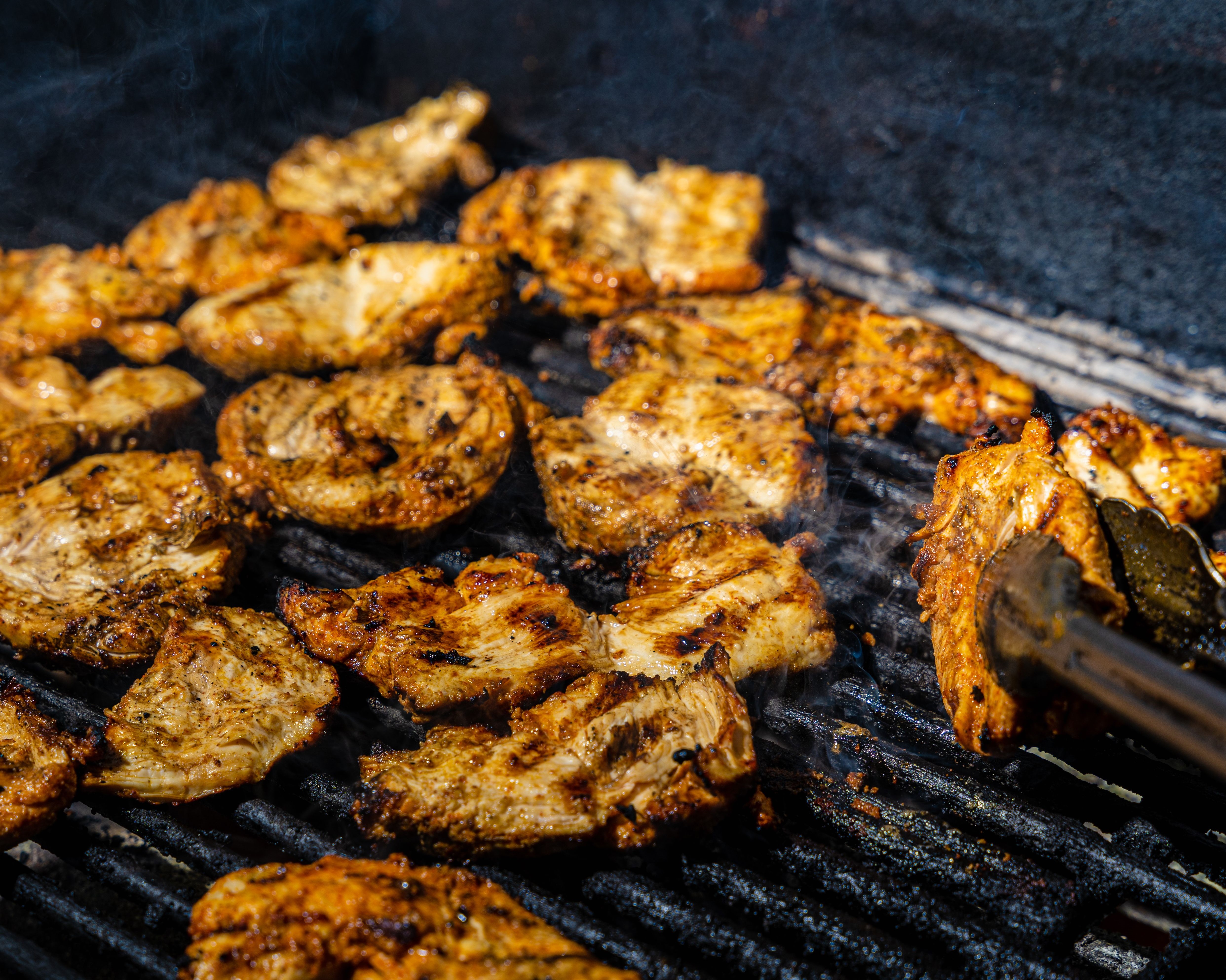 Chicken on the grill with house-made teriyaki glaze